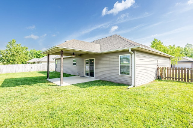 back of property featuring a patio area, ceiling fan, and a shingled roof