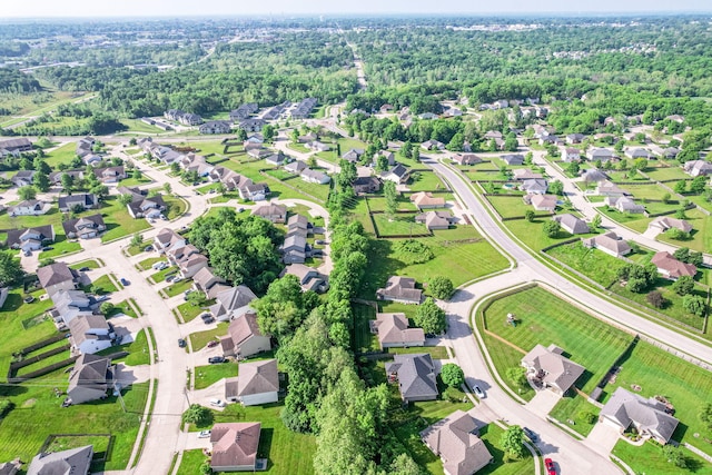 aerial view of property's location featuring nearby suburban area