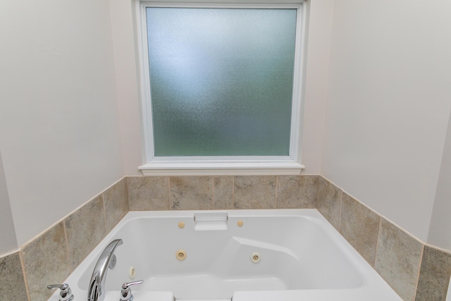 full bath with a jetted tub