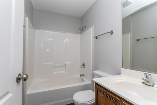 full bath with toilet, vanity, and bathing tub / shower combination