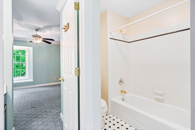 full bathroom featuring toilet, baseboards, a ceiling fan, and  shower combination