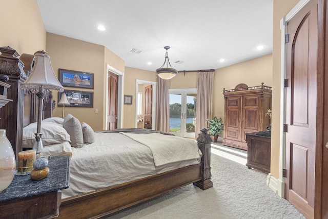 bedroom featuring carpet floors, recessed lighting, and access to exterior