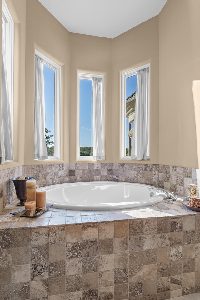 bathroom featuring a garden tub