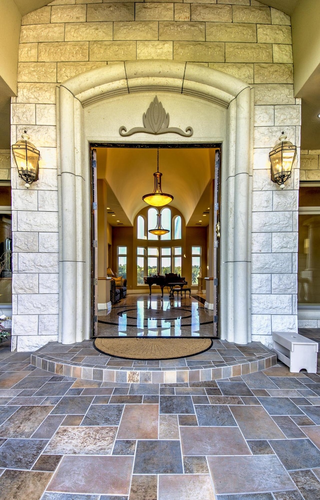 view of exterior entry with stone siding
