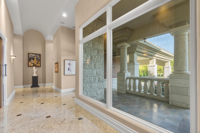 bathroom with decorative columns, baseboards, granite floors, and recessed lighting
