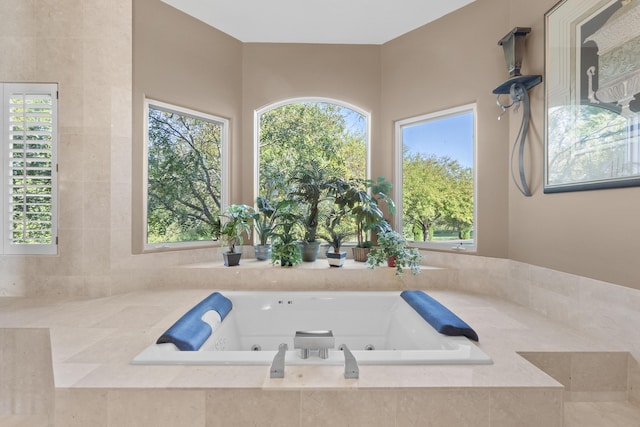 full bath featuring a tub with jets
