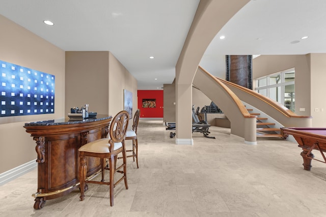 indoor dry bar featuring baseboards, stairway, recessed lighting, pool table, and arched walkways