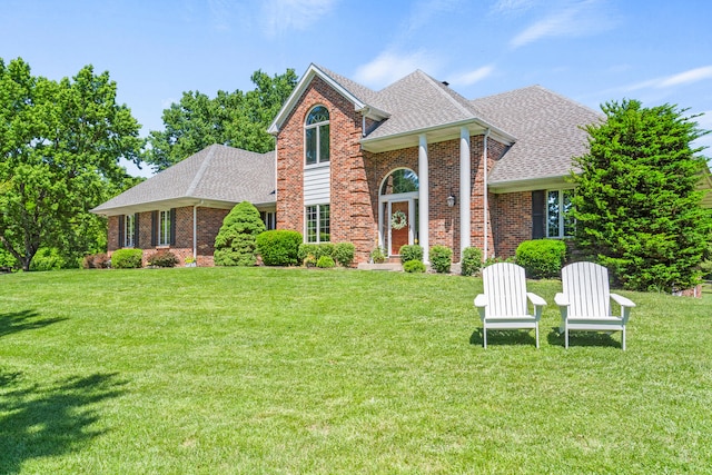 4700 E Deer Noll Rd, Columbia, MO 65201 - view of front of home with a shingled roof and a front yard