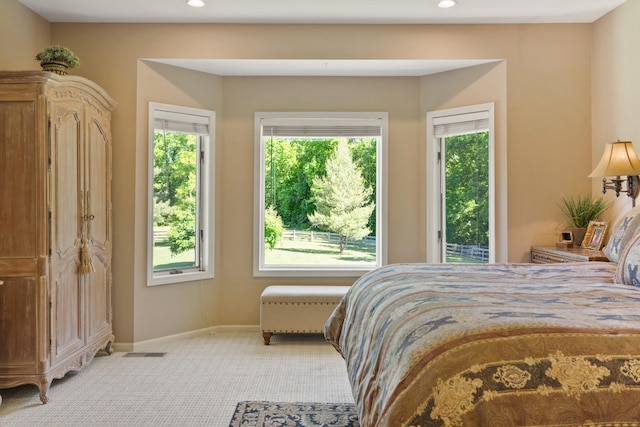 4700 E Deer Noll Rd, Columbia, MO 65201 - bedroom featuring light colored carpet, recessed lighting, baseboards, and access to outside