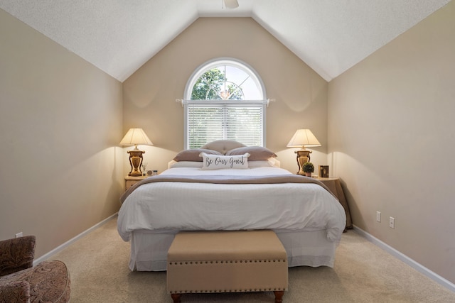 4700 E Deer Noll Rd, Columbia, MO 65201 - carpeted bedroom with vaulted ceiling and baseboards