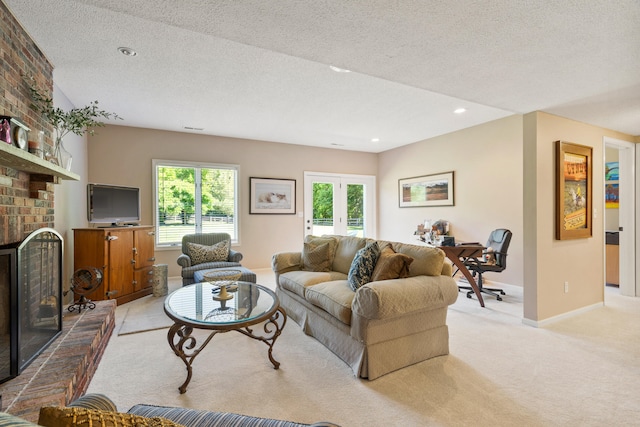4700 E Deer Noll Rd, Columbia, MO 65201 - living room featuring a brick fireplace, baseboards, light colored carpet, a textured ceiling, and french doors