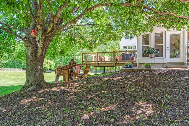 4700 E Deer Noll Rd, Columbia, MO 65201 - view of yard with a wooden deck