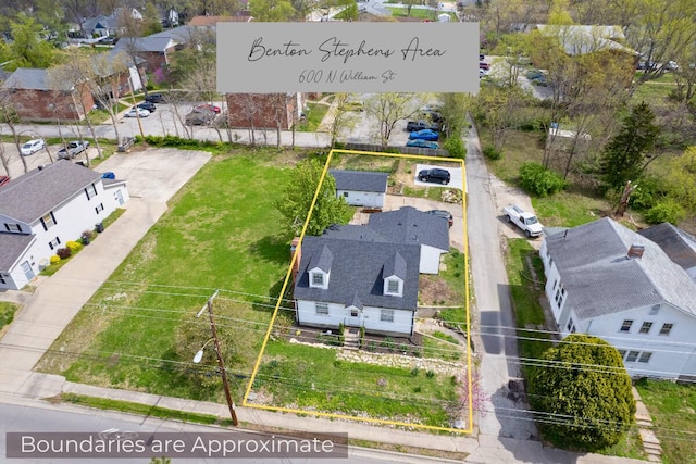 aerial perspective of suburban area featuring property boundaries highlighted