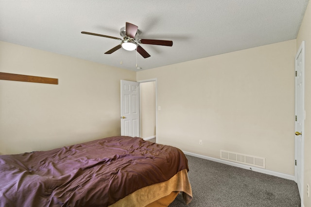 carpeted bedroom with a ceiling fan and baseboards