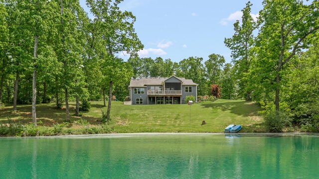5560 Sillivan Dr, Fulton, MO 65231 - back of house with a lawn and a deck with water view