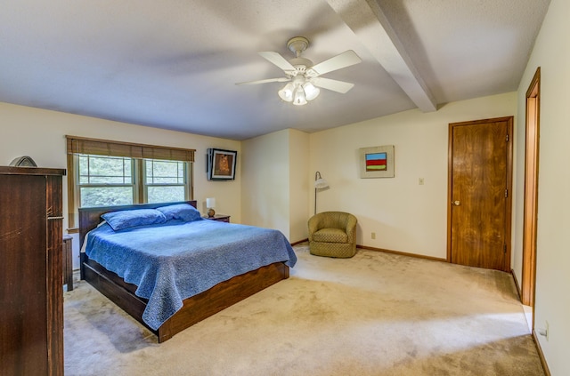 1209 Sunset Dr, Columbia, MO 65203 - bedroom with carpet flooring, beam ceiling, baseboards, and ceiling fan