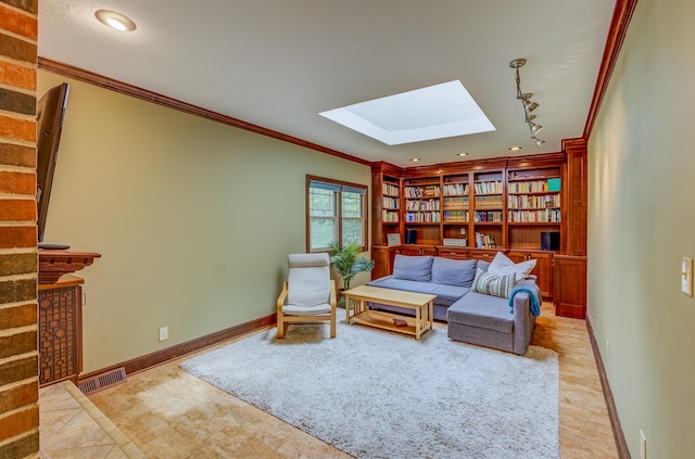 1209 Sunset Dr, Columbia, MO 65203 - living room with a skylight, crown molding, baseboards, built in features, and rail lighting
