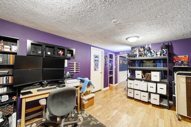 office area featuring a textured ceiling and wood finished floors