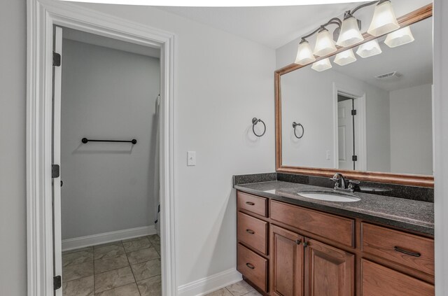 5300 Perche Pointe Pl, Columbia, MO 65203 - bathroom featuring vanity, baseboards, and marble look tile flooring