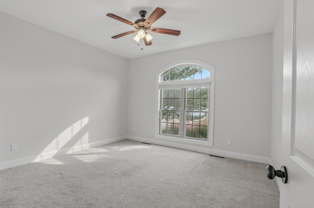 5300 Perche Pointe Pl, Columbia, MO 65203 - unfurnished room with carpet, baseboards, and ceiling fan