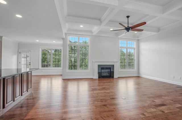 5300 Perche Pointe Pl, Columbia, MO 65203 - unfurnished living room featuring ceiling fan, recessed lighting, wood finished floors, beam ceiling, and a glass covered fireplace
