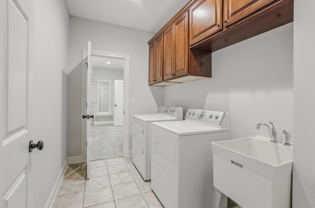 5300 Perche Pointe Pl, Columbia, MO 65203 - washroom with separate washer and dryer, cabinet space, baseboards, and recessed lighting
