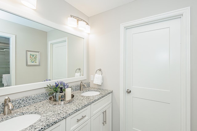 bathroom featuring double vanity