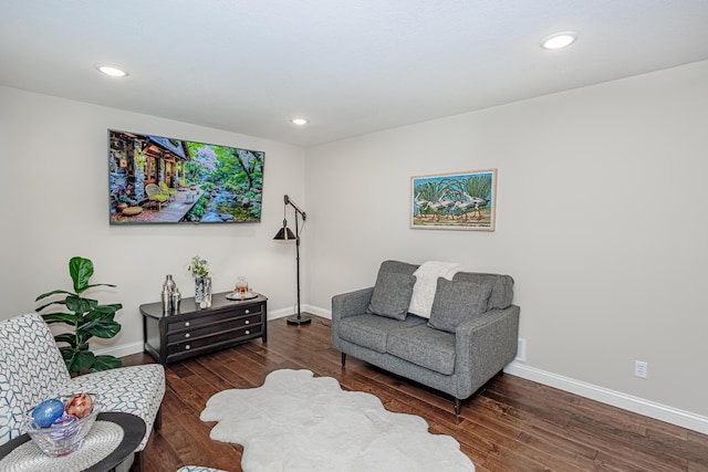sitting room featuring wood finished floors, baseboards, and recessed lighting