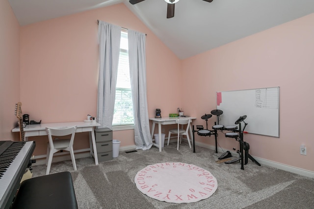 carpeted office featuring lofted ceiling, a ceiling fan, and baseboards