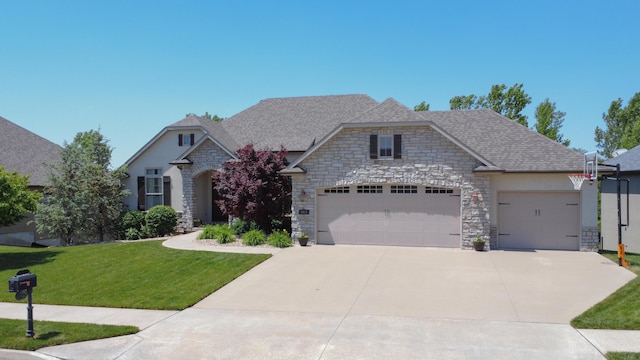 view of front of house with stone siding, driveway, a garage, and a front lawn