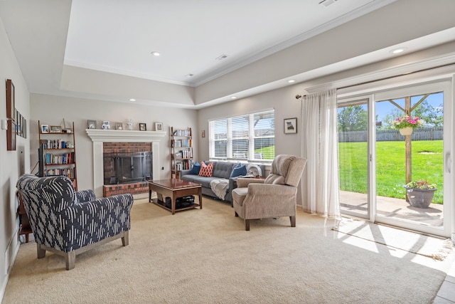 3605 Scottson Way, Columbia, MO 65203 - living area with crown molding, light carpet, recessed lighting, a brick fireplace, and a tray ceiling