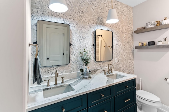 4710 Winding Wood Ct, Columbia, MO 65203 - full bathroom featuring double vanity and wallpapered walls