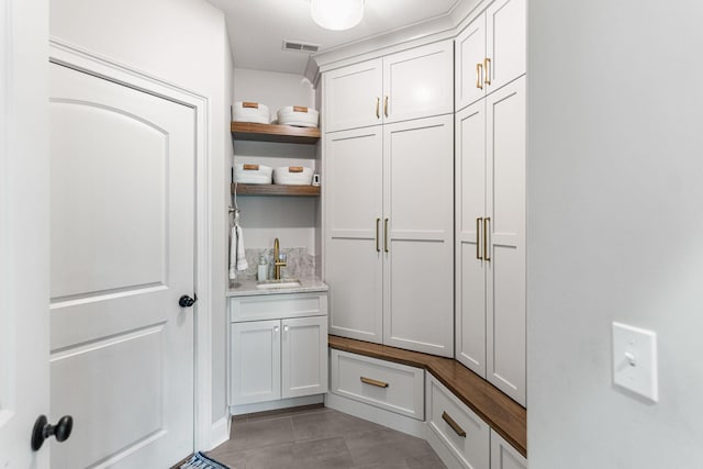 4710 Winding Wood Ct, Columbia, MO 65203 - mudroom featuring a sink and light tile patterned floors