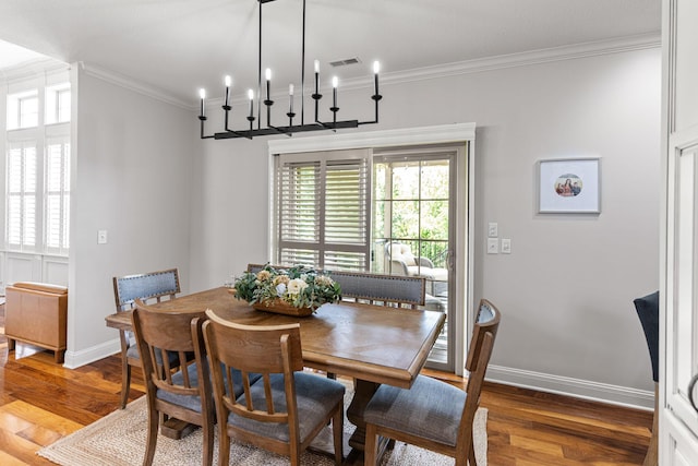 4710 Winding Wood Ct, Columbia, MO 65203 - dining room with wood finished floors and ornamental molding