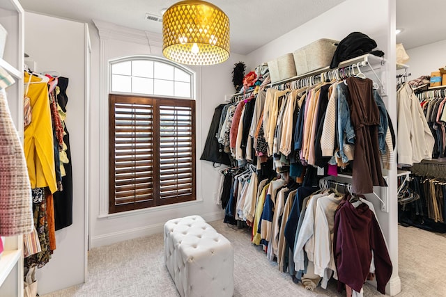 4710 Winding Wood Ct, Columbia, MO 65203 - spacious closet with carpet flooring and a chandelier