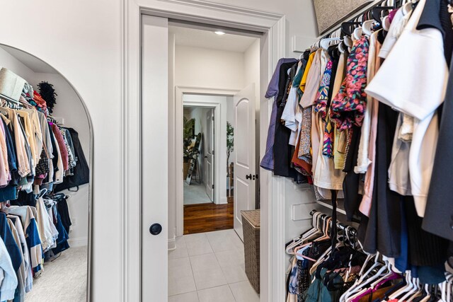 4710 Winding Wood Ct, Columbia, MO 65203 - walk in closet with light tile patterned flooring