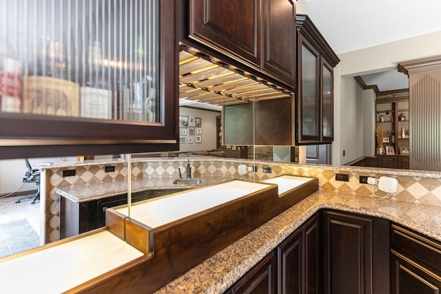 4710 Winding Wood Ct, Columbia, MO 65203 - bathroom featuring backsplash and crown molding