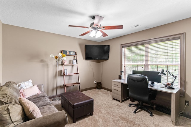 4710 Winding Wood Ct, Columbia, MO 65203 - home office with a ceiling fan and light carpet