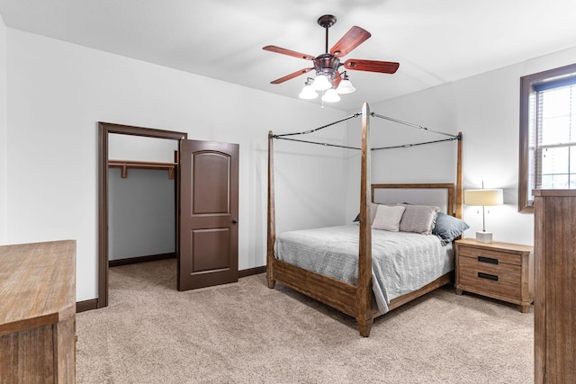 4710 Winding Wood Ct, Columbia, MO 65203 - bedroom featuring light colored carpet and a ceiling fan