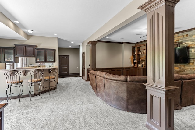 4710 Winding Wood Ct, Columbia, MO 65203 - living room featuring ornate columns, light carpet, and recessed lighting