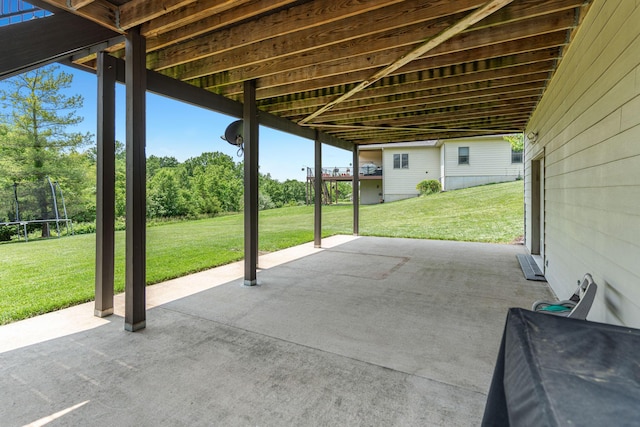 4710 Winding Wood Ct, Columbia, MO 65203 - view of patio featuring a trampoline