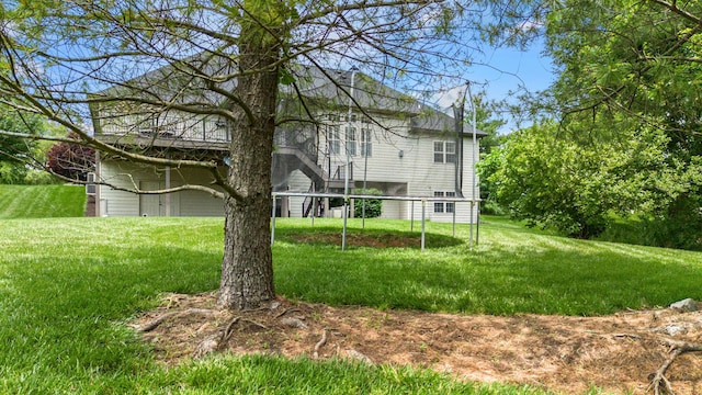 4710 Winding Wood Ct, Columbia, MO 65203 - rear view of house with a lawn