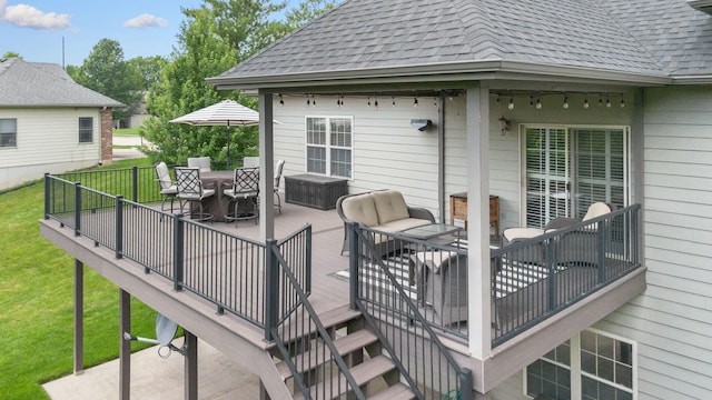 4710 Winding Wood Ct, Columbia, MO 65203 - wooden deck featuring a yard, an outdoor hangout area, outdoor dining space, and stairway