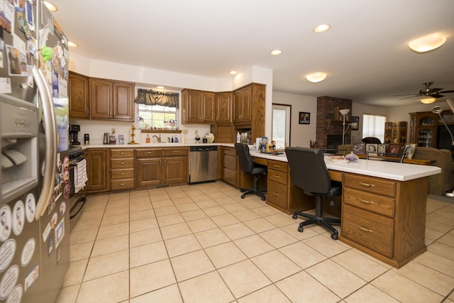 705 Redwood Dr, Ashland, MO 65010 - kitchen with appliances with stainless steel finishes, a peninsula, light countertops, open floor plan, and a sink