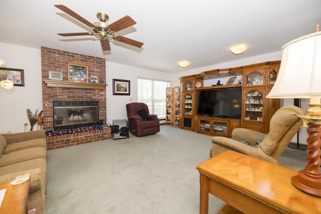705 Redwood Dr, Ashland, MO 65010 - carpeted living room featuring a ceiling fan and a brick fireplace