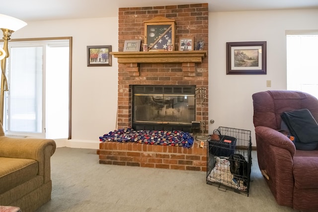 705 Redwood Dr, Ashland, MO 65010 - carpeted living room with a fireplace and baseboards