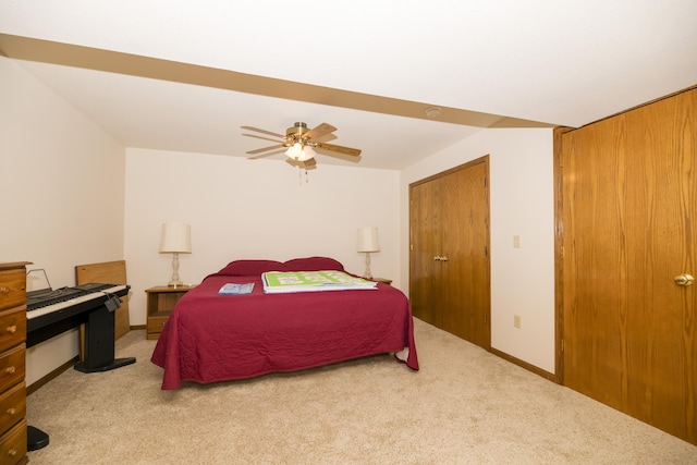 705 Redwood Dr, Ashland, MO 65010 - bedroom featuring light colored carpet, ceiling fan, and baseboards