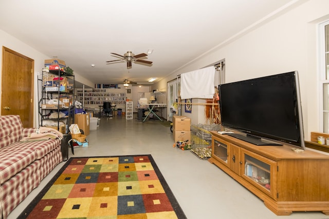 705 Redwood Dr, Ashland, MO 65010 - living room featuring ceiling fan and finished concrete floors