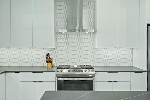 540 Angels Rest Way, Columbia, MO 65203 - kitchen featuring gas stove, wall chimney exhaust hood, white cabinetry, and decorative backsplash