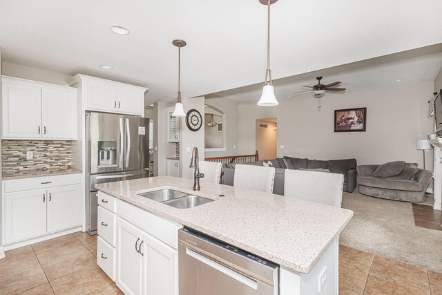 4105 Astoria Way, Columbia, MO 65203 - kitchen with appliances with stainless steel finishes, a sink, open floor plan, an island with sink, and ceiling fan